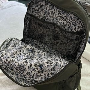 back pack with tons of pockets, bought in two colors & selling the olive green